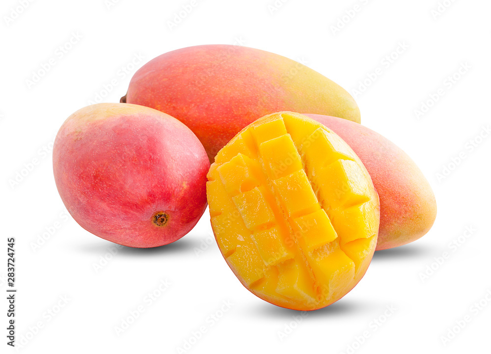 Mango fruit with mango cubes and slices. Isolated on a white background. Mango fruit with mango cubes and slices. Isolated on a white background.