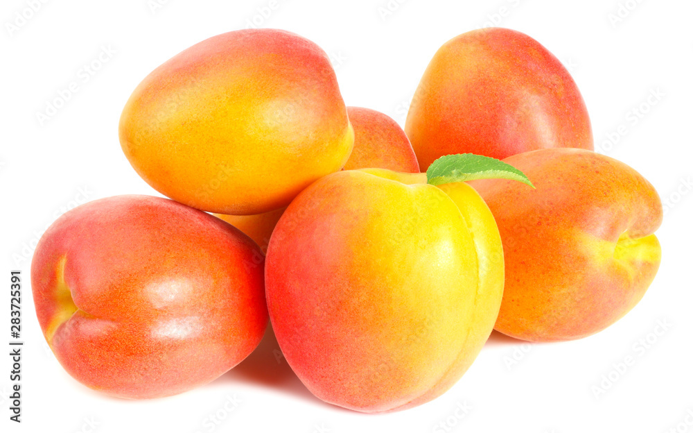 apricot fruits with slices and green leaf isolated on white background apricot fruits with slices and green leaf isolated on white background