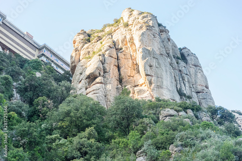 Sanctuary of Our Lady of Montserrat, place of worship on top of the mountain. Montserrat is a rock massif traditionally considered the most important and significant mountain in Catalonia, Spain © Fernando Cortés