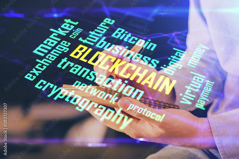 Man's hands working with notes background. Cryptocurrency and finance concept. Man's hands working with notes background. Cryptocurrency and finance concept.