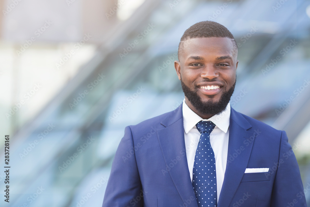 Confident Afro Businessman Smiling And Looking At Camera Outdoor Confident Afro Businessman Smiling And Looking At Camera Outdoor