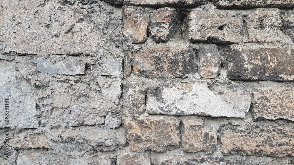 Background texture of grunge brick wall in industrial loft style Background texture of grunge brick wall in industrial loft style