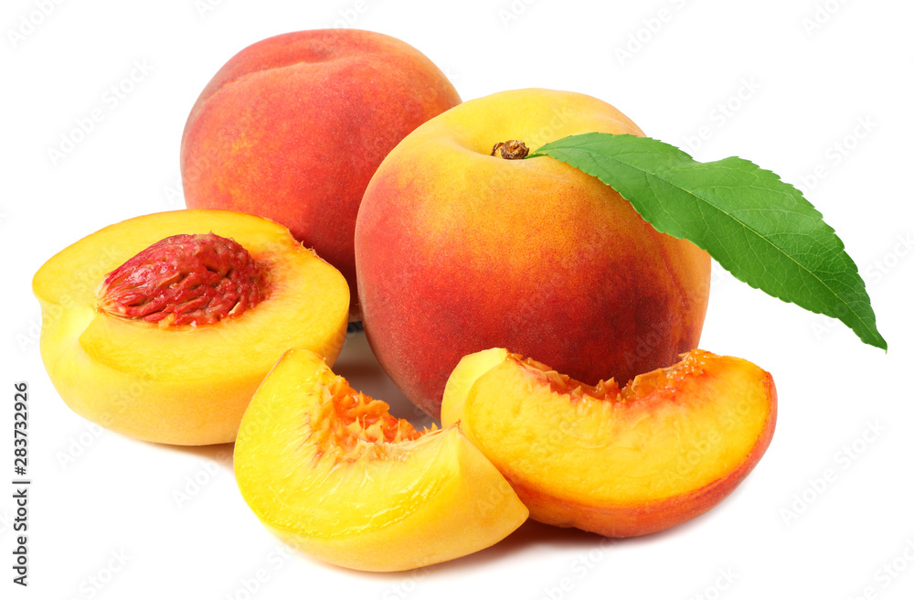 peach fruit with green leaves and slices isolated on white background peach fruit with green leaves and slices isolated on white background