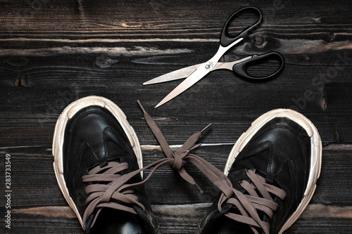Photos unchained concept -learn how to tie shoelaces