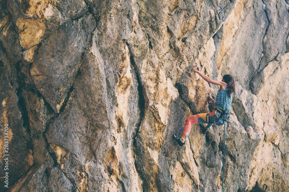 Climber trains on the rocks of Croatia. Climber trains on the rocks of Croatia.