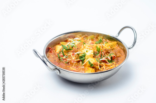 Kadai Paneer / Typical Indian Cheese cooked with vegetables in a spicy hot curry sauce in a Kadai pan