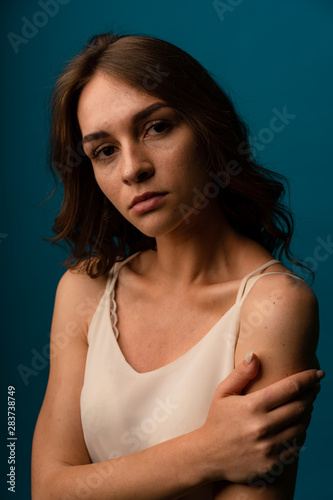 Young attractive woman at home feeling sad tired and worried suffering depression in mental health, problems and broken heart concept.