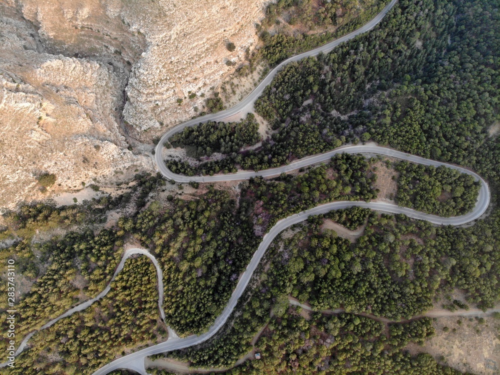 Mountain road view from top to down. Mountains and forest. Rhodes island. 