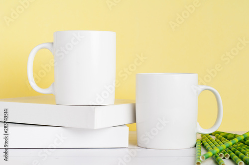 Fotografie, Obraz white mug mockup on a yellow background