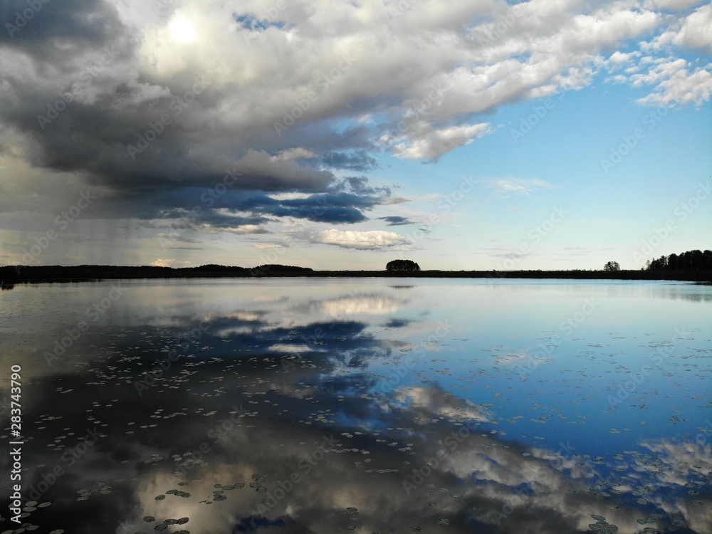 Mirror calm Lake in forest and swamp. Marsh. Aerial view