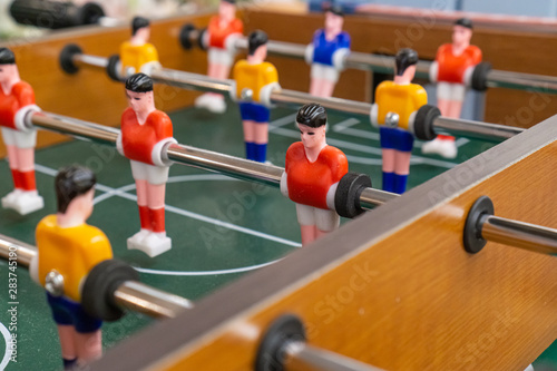 Close up of colorful foosball figures