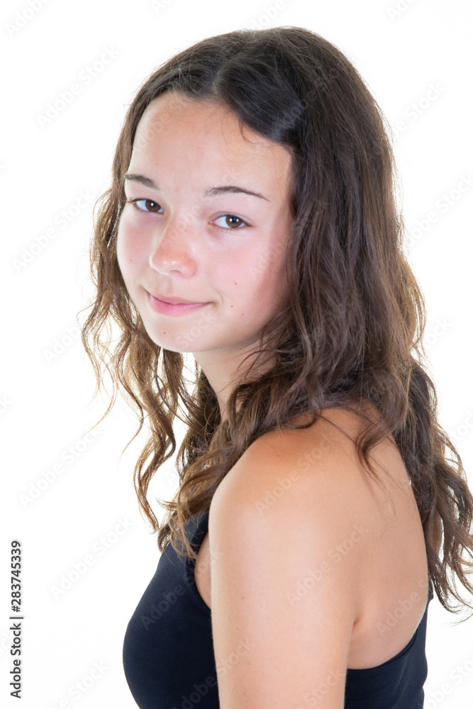 fashion pose in studio teenage girl smiling looking at camera fashion pose in studio teenage girl smiling looking at camera