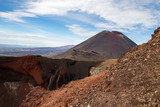 Landscape of red crater with volcano in the backround in new zealand north island