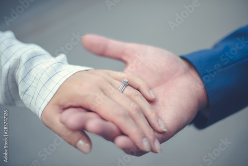 Hands with wedding ring