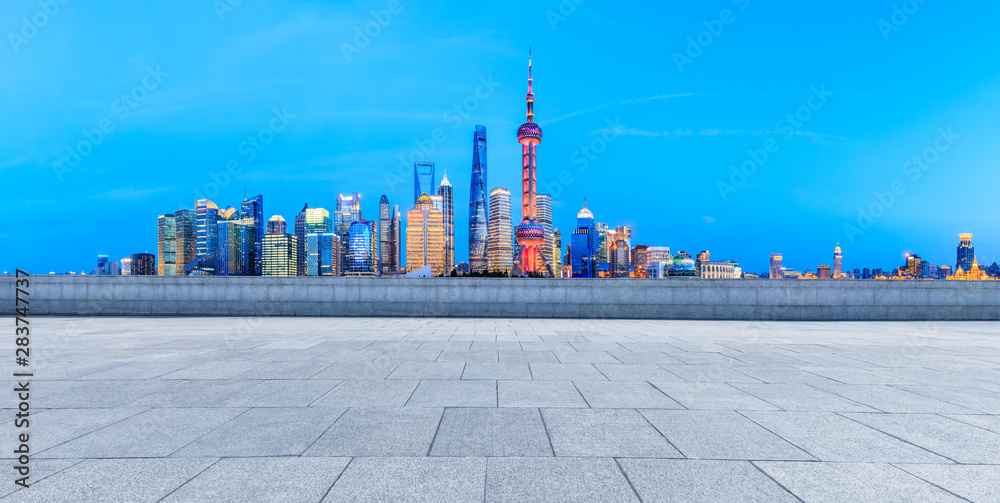 Shanghai cityscape and square floor at night