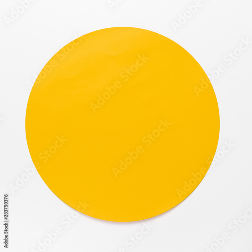 Top view yellow circle on white background