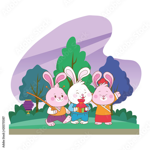 Rabbits celebrating mid autumn festival cartoons © Jemastock