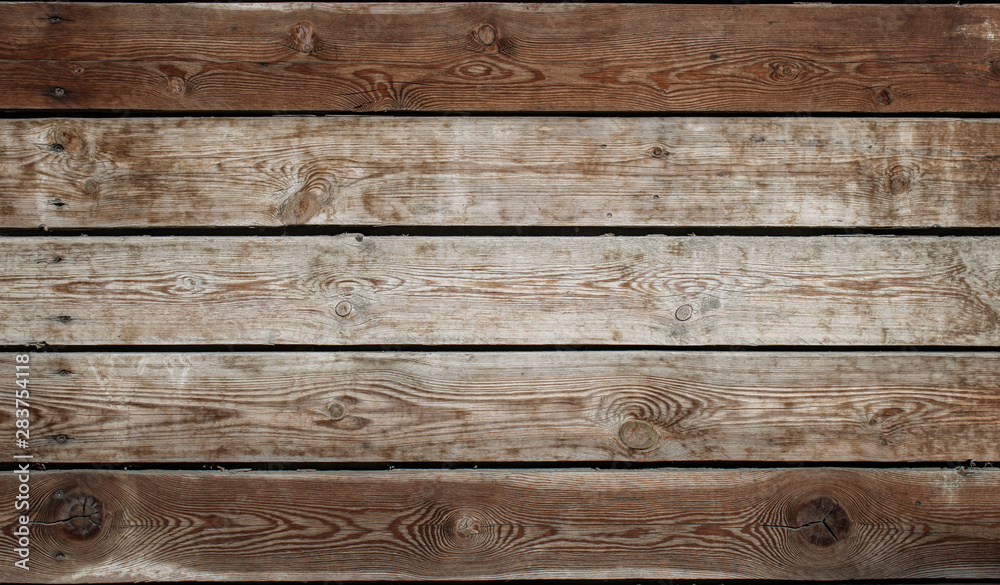 Photo of light wood texture. Wall of old wooden boards. Natural background