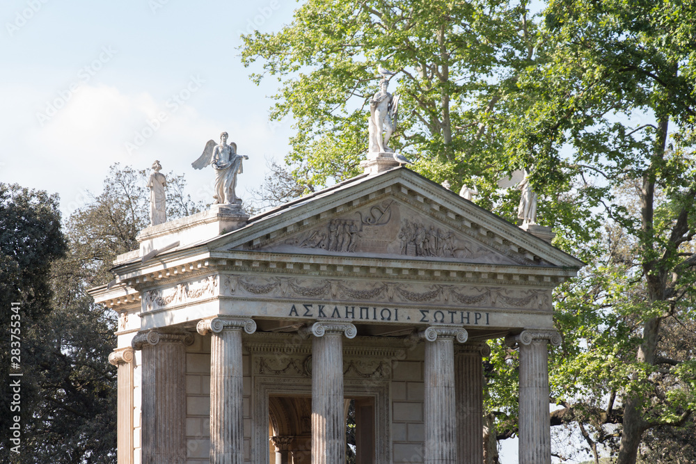 Fragment of facade of Aesculapius Temple in the Villa Borghese Gardens , Pincian Hill, Rome, Italy.