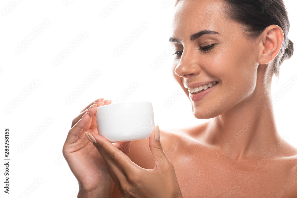 naked young woman holding cosmetic cream and laughing isolated on white naked young woman holding cosmetic cream and laughing isolated on white