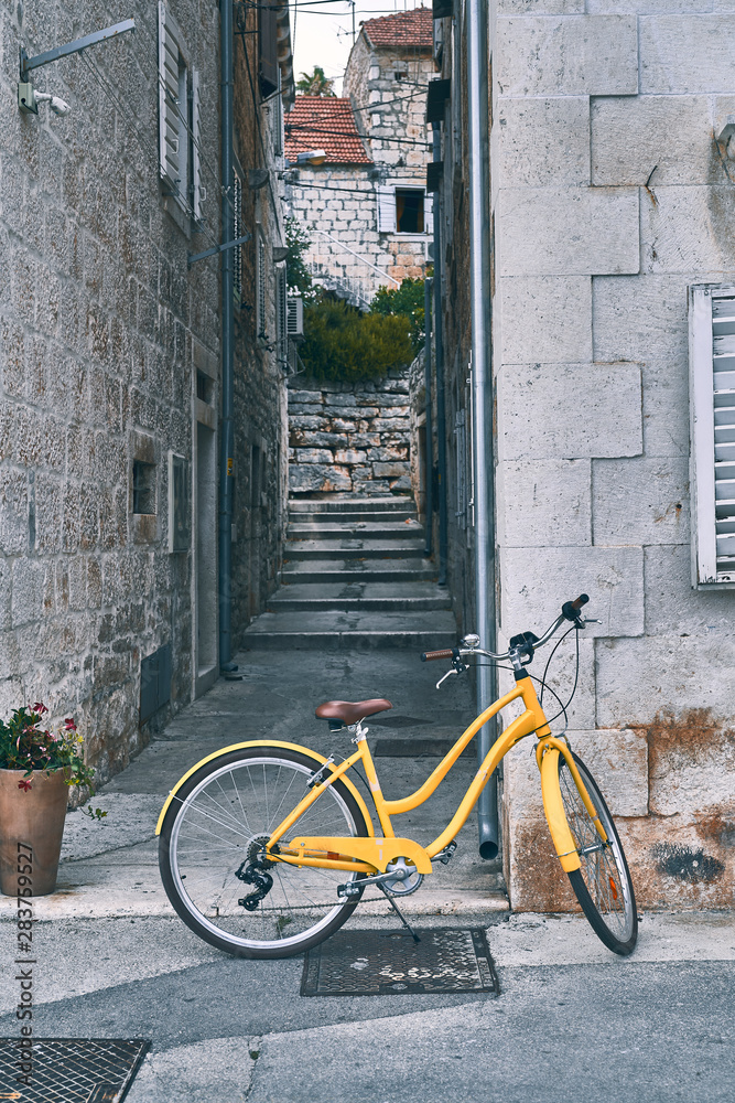 Yellow bicycle on the street