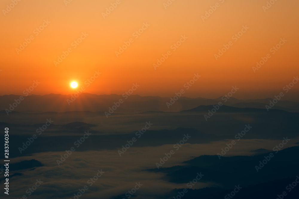 Beautiful panoramic landscape sunrise  and mountains with fog in the morning