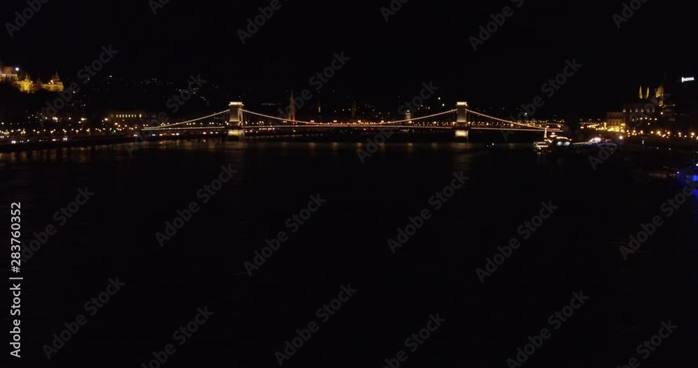 The iconic landmark, the Chain Bridge in the evening in Budapest. The iconic landmark, the Chain Bridge in the evening in Budapest.