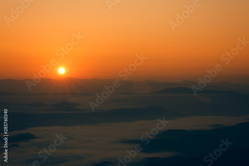 Beautiful panoramic landscape sunrise and mountains with fog in the morning