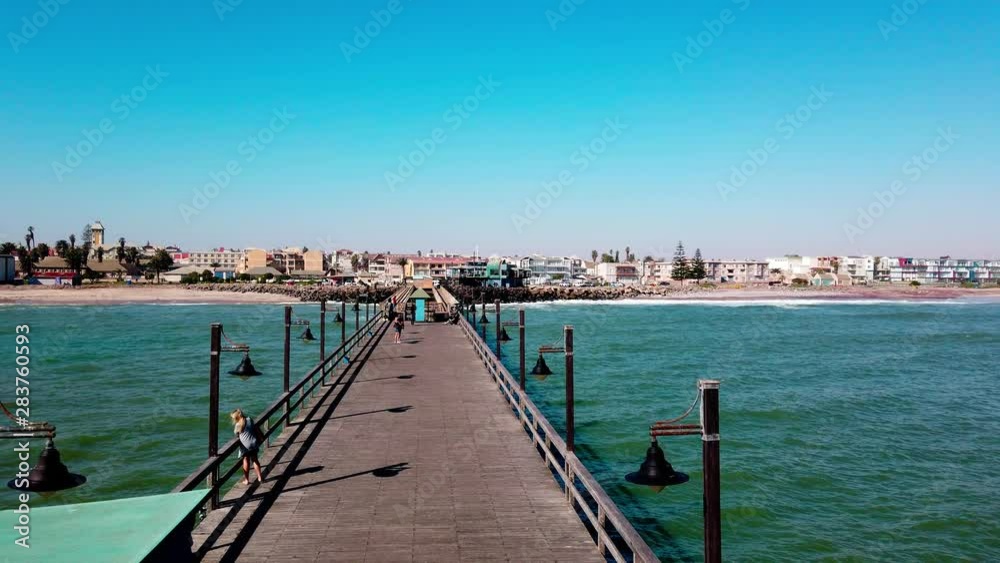 4K view of Swakopmund, Namibia from the ocean pier. Swakopmund shoreline. Pier in the ocean. 4K view of Swakopmund, Namibia from the ocean pier. Swakopmund shoreline. Pier in the ocean.