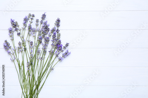 Fototapeta Naklejka Na Ścianę i Meble -  Lavender flowers on white wooden table