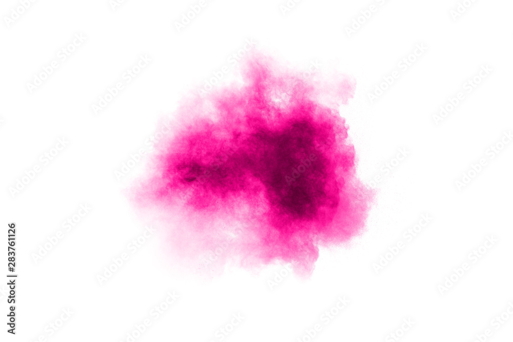 Abstract pink powder explosion on white background. Freeze motion of pink dust splattered. Abstract pink powder explosion on white background. Freeze motion of pink dust splattered.