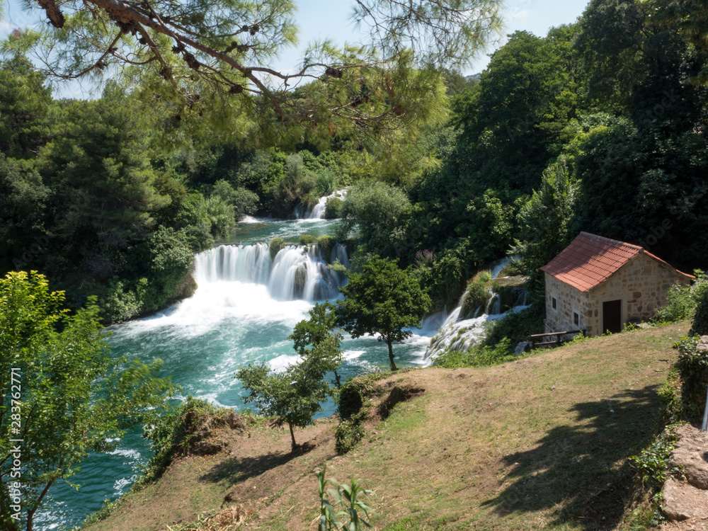 Croatia, august 2019: Beautiful summer view of Krka National Park, Roski Slap location, Europe. Amazing world of Mediterranean countries. Traveling concept background.