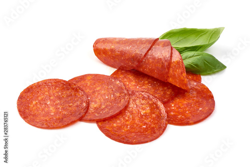Chorizo sausage slices, Traditional spanish sausage, isolated on white background