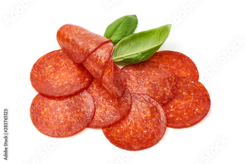 Chorizo sausage slices, Traditional spanish sausage, isolated on white background photo