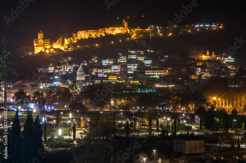 Night view of old Tbilisi. Narikala Fortress and other landmarks of the city. © k_samurkas