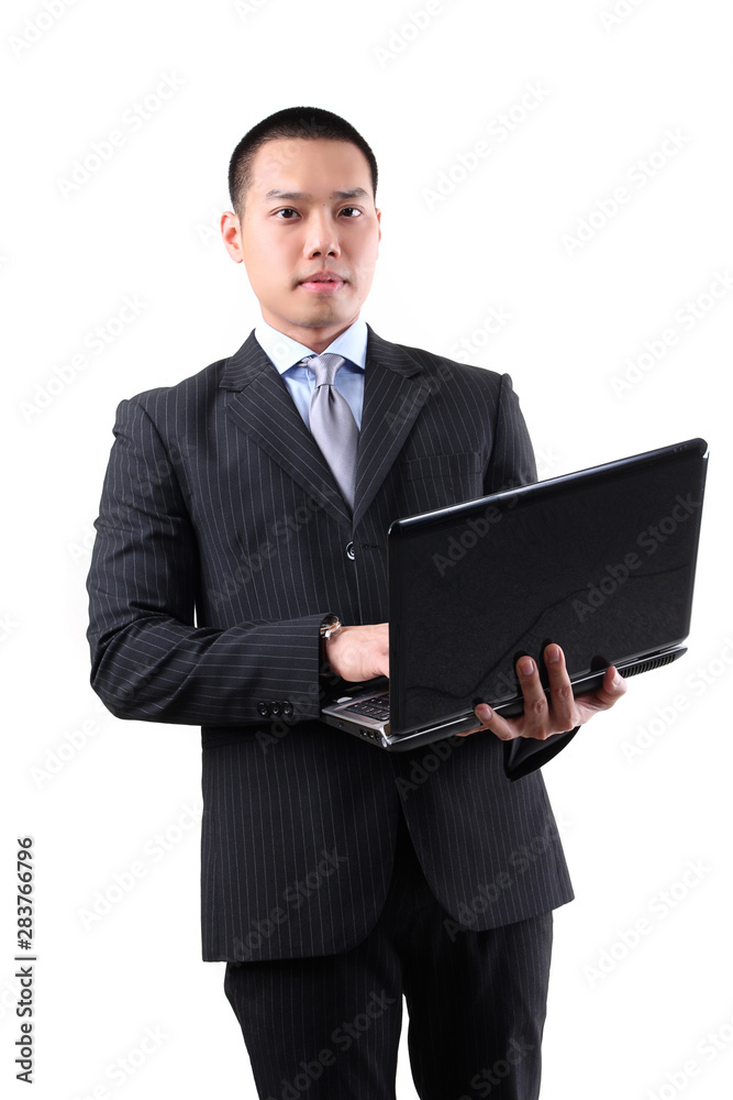 Young asian businessman holding laptop Young asian businessman holding laptop