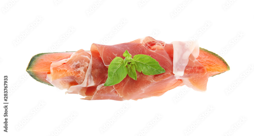 Slice of fresh melon with prosciutto and basil on white background, top view Slice of fresh melon with prosciutto and basil on white background, top view