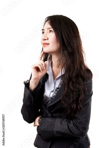 Beautiful Asian young business woman is thinking