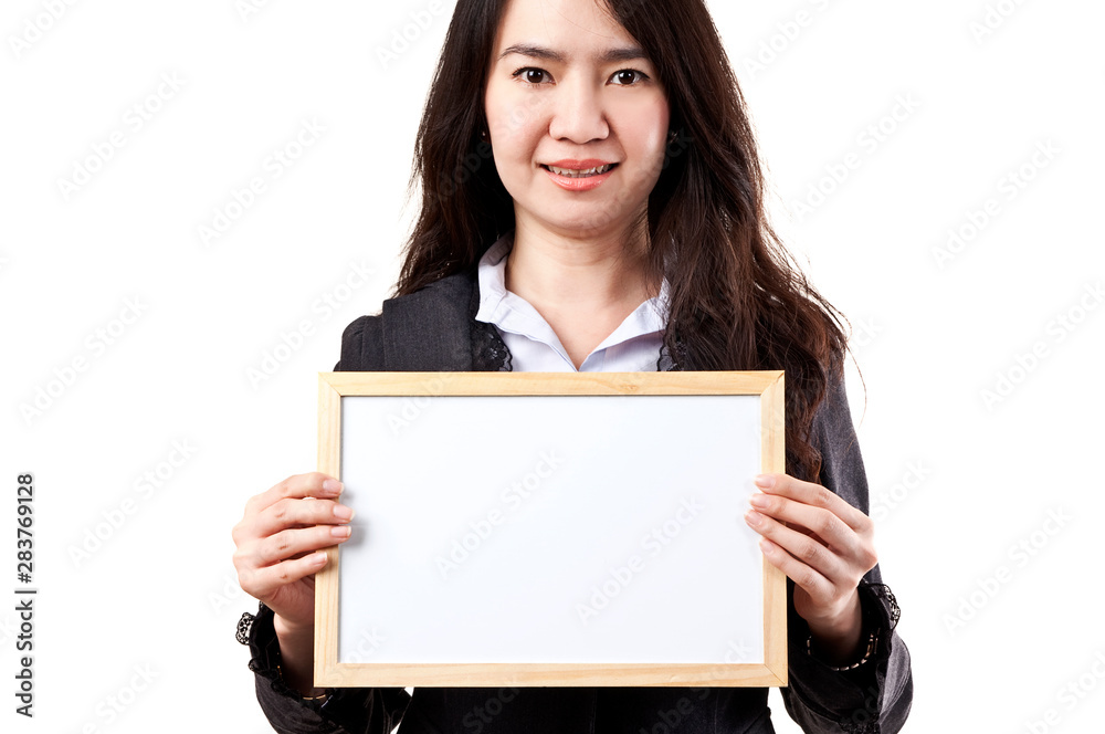 Business woman holding a blank white board Business woman holding a blank white board