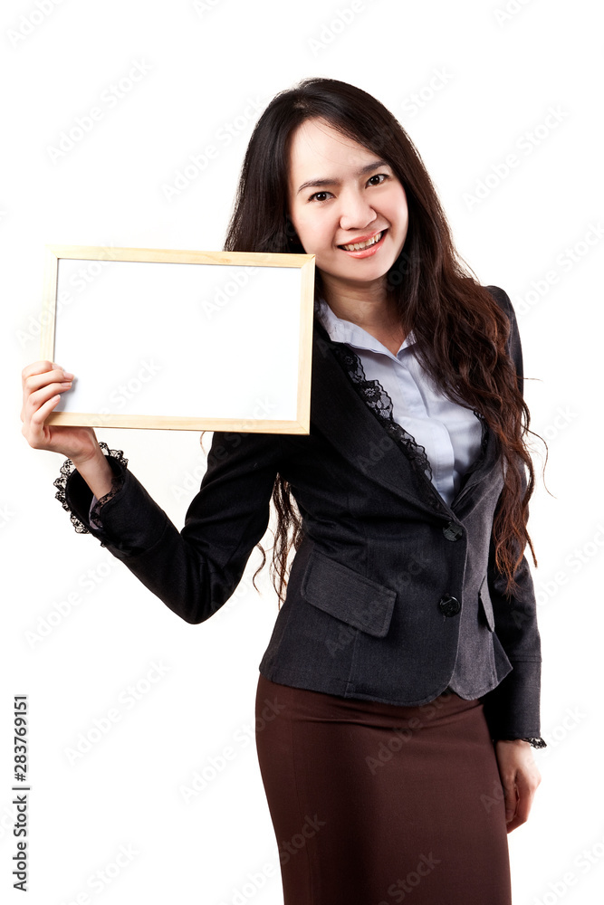Business woman holding a blank white board Business woman holding a blank white board