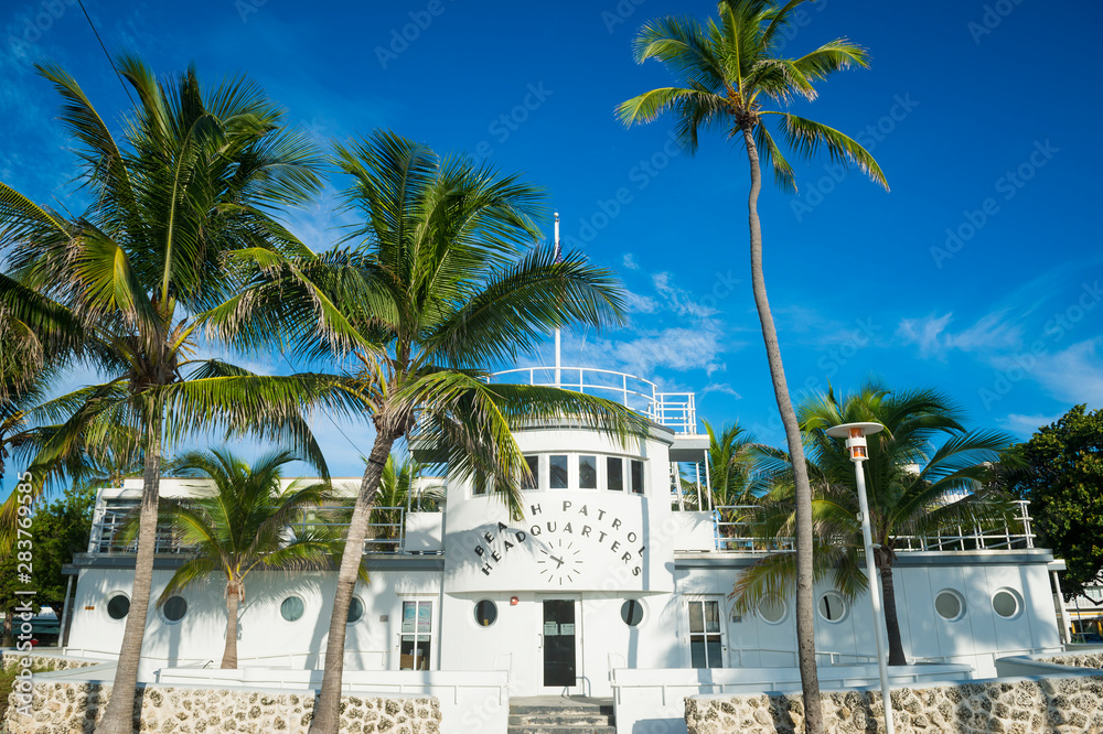 Art Deco Beach Patrol Headquarters building with palm trees in South Beach, Miami, Florida, USA