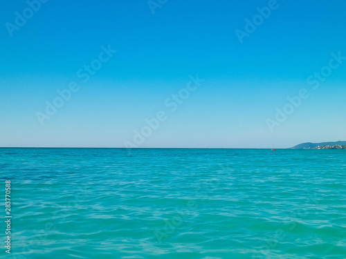 Blue water of Tyrrhenian sea in Vada  Tuscany  Italy.