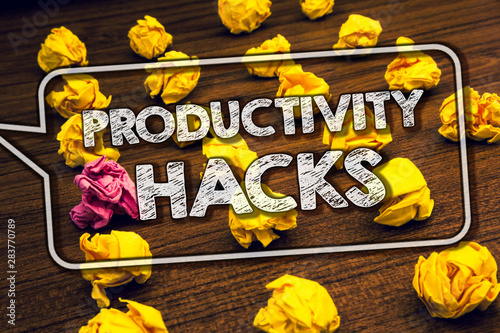 Writing note showing Productivity Hacks. Business photo showcasing Hacking Solution Method Tips Efficiency Productivity Timbered ground serially laid yellow paper lumps white words photo