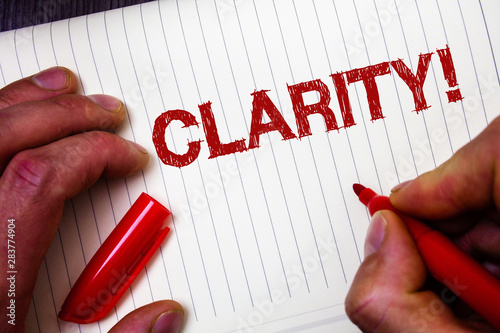 Conceptual hand writing showing Clarity. Business photo showcasing Certainty Precision Purity Comprehensibility Transparency Accuracy Man hold holding marker paper thoughts messages intentions photo