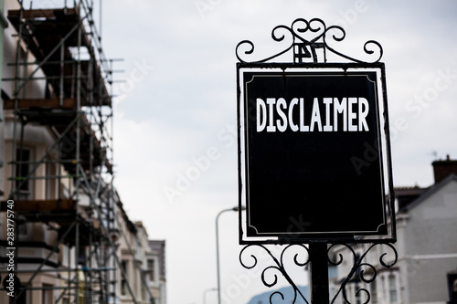 Writing note showing Disclaimer. Business photo showcasing Terms and Conditions Statement to Denial of Legal Claim Copyright Vintage black board sky old city ideas scaffolding landscapes antique
