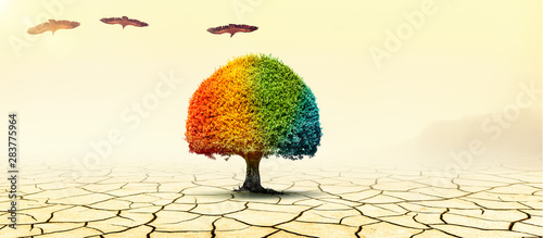 Bunter Baum in einer Landschaft zum Thema Klimawandel