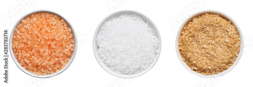 SPA concept. Set of bath salt in bowl isolated over white background with clipping path. Top view