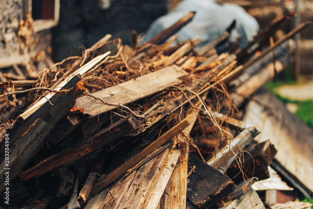 Abandoned wooden building, a ruin built of wood planks, destroyed, collapsed property Abandoned wooden building, a ruin built of wood planks, destroyed, collapsed property