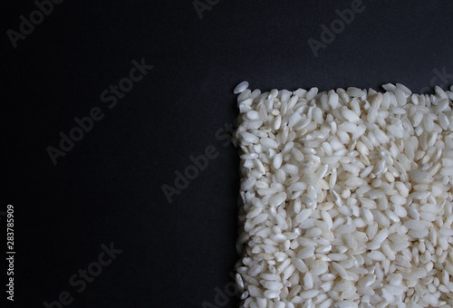 rice on a black background, isolated
