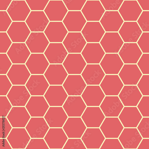 Vibrant coral red and yellow honeycomb design. Seamless vector pattern. Great for wellbeing, spa, health products, stationery, giftwrap, home decor